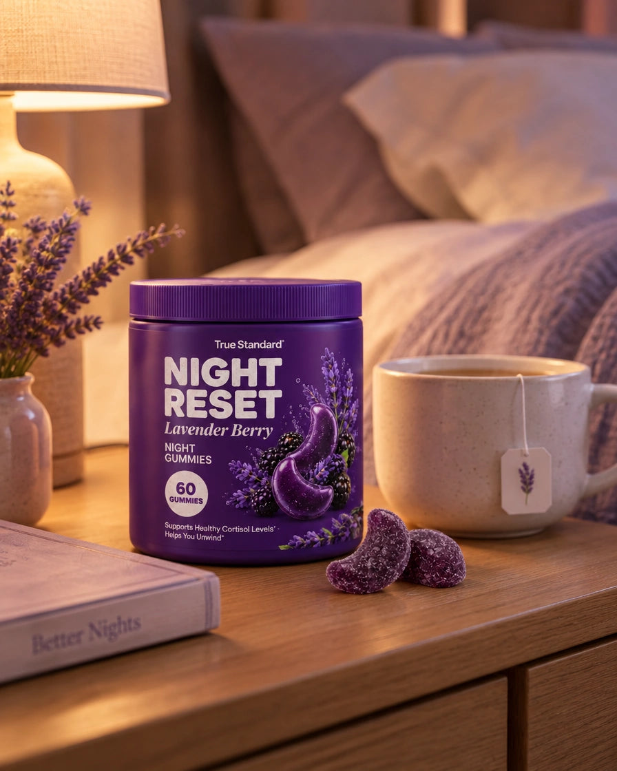 Night Reset gummies on a bedside table